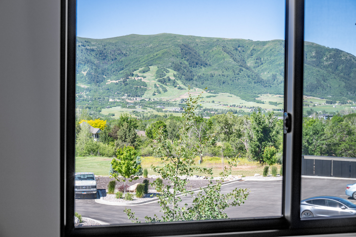 Scenic mountain views from the main-level bedroom window.