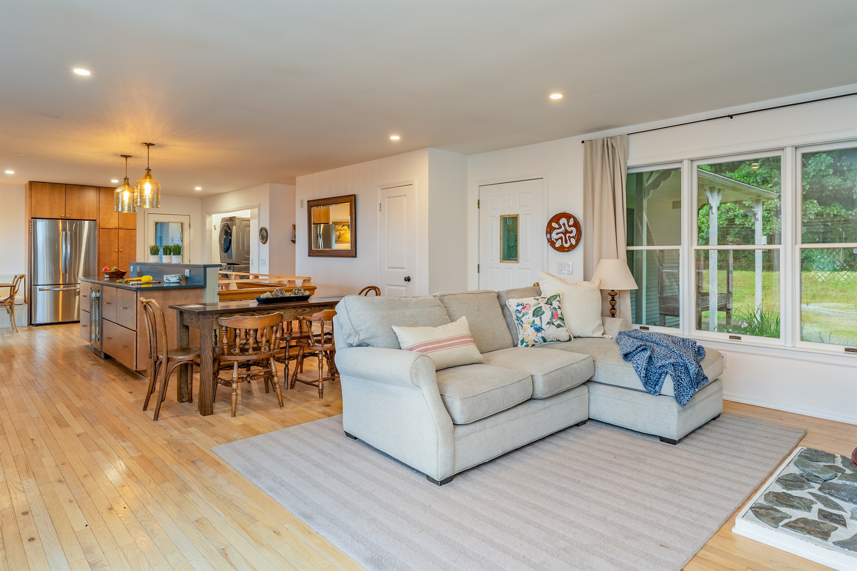 Enjoy open-concept living with a spacious layout, rustic wood accents, and a warm, inviting atmosphere perfect for family gatherings.