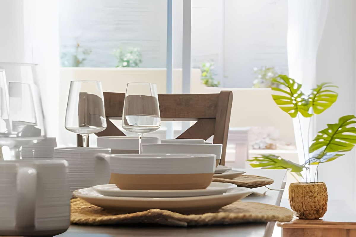 Enjoy a meal or a drink at this cozy dining table.