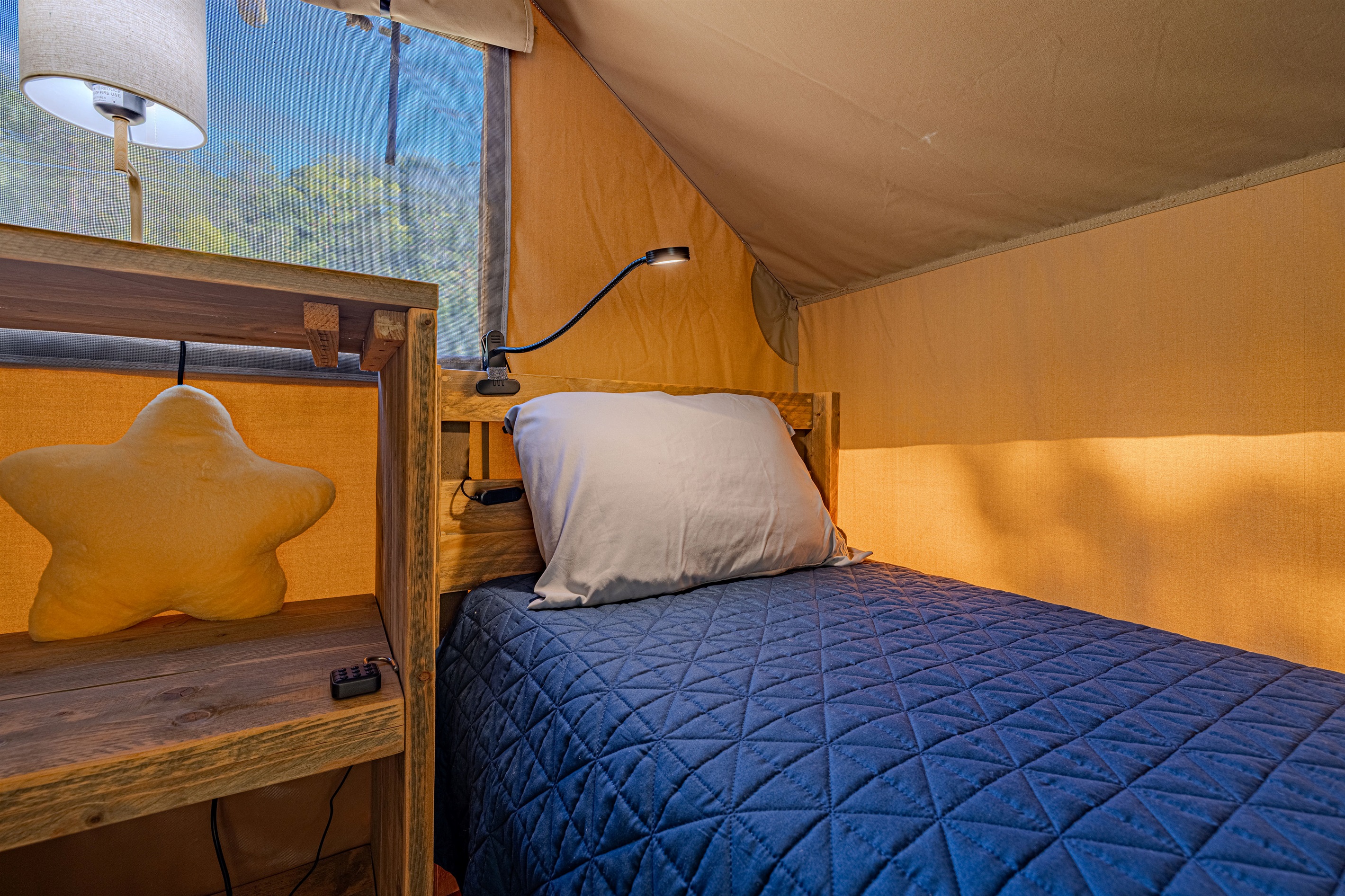 Rest easy after a day of adventure. This cozy, comfortable bed is waiting for you.