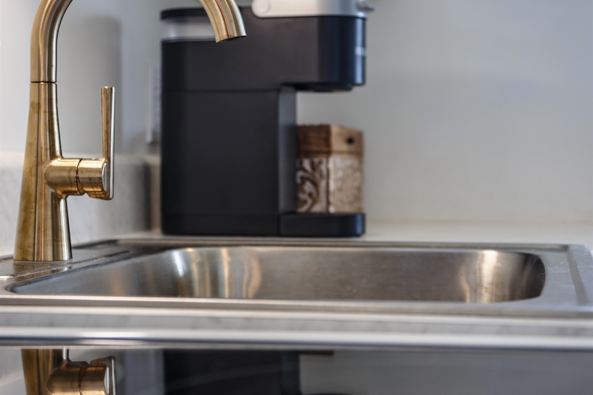 Modern sink and fixtures with natural light.