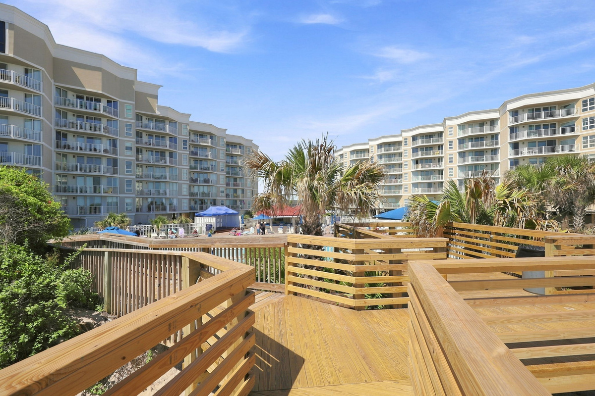 Scenic path along the wooden boardwalk offering a direct route from the property to the beach.