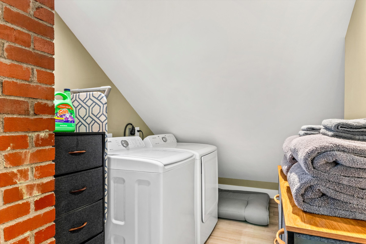 The Penthouse: Full size washer & dryer with detergent provided.