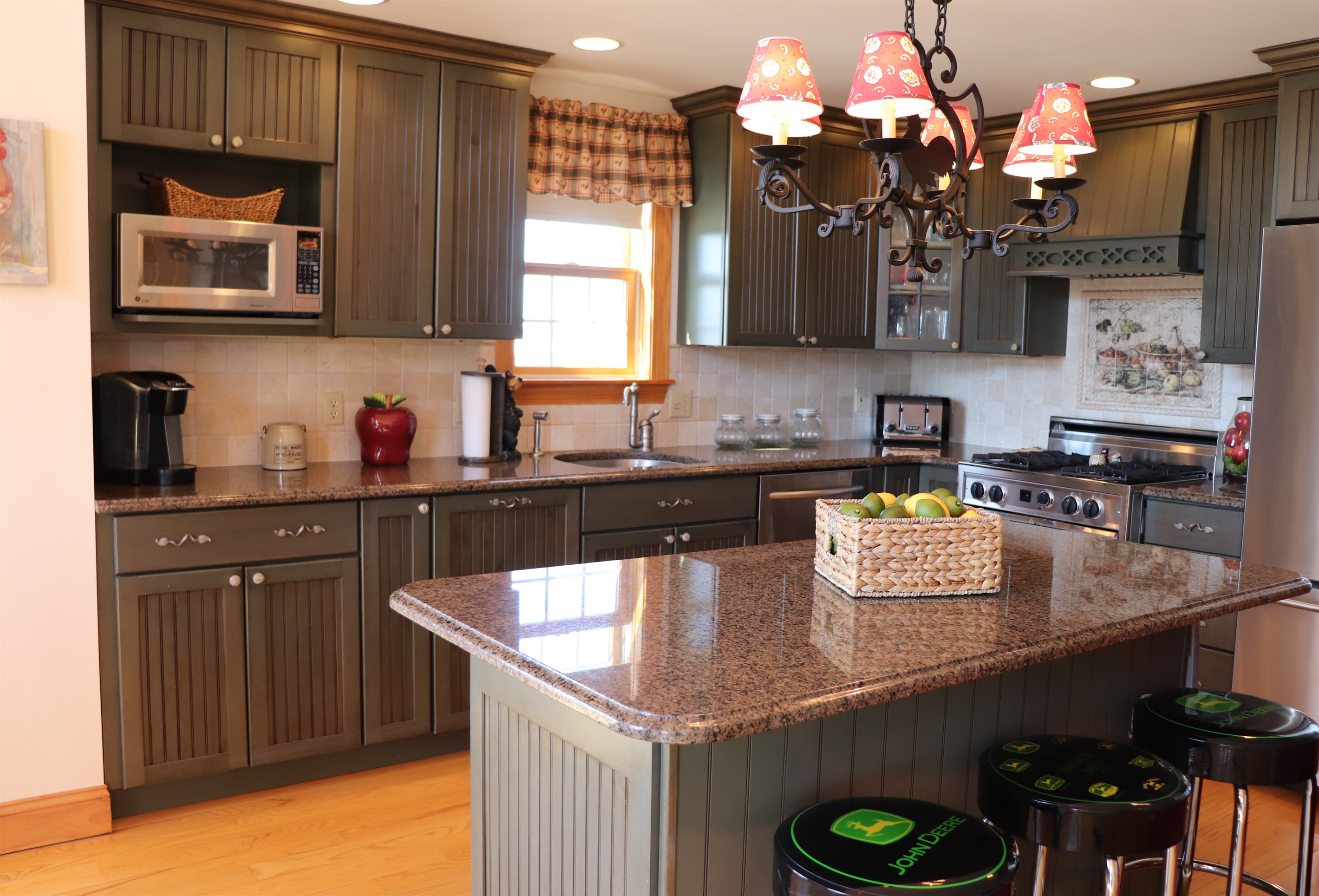 High end kitchen with a large island and lots of prep space.