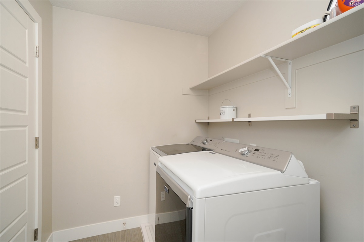 Convenient upstairs laundry room.
