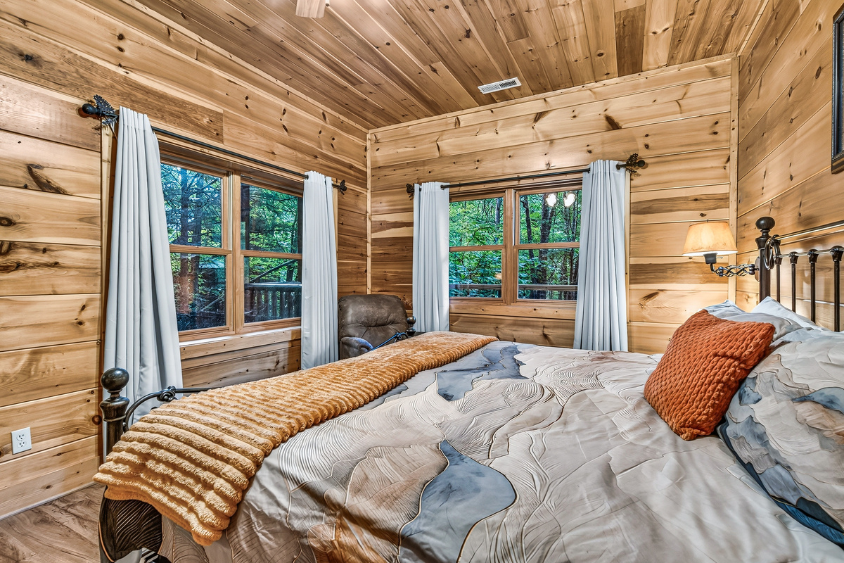 A restful sanctuary featuring comfortable bedding, cozy reading corners, and natural light.