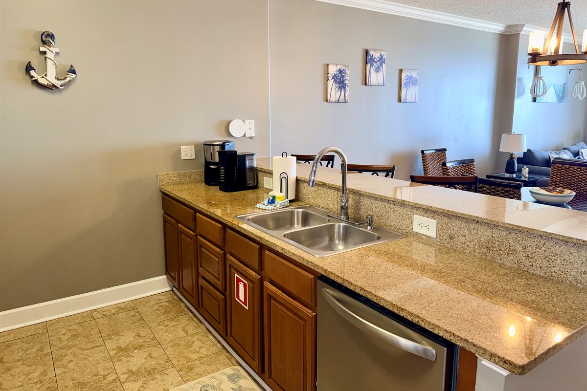 Fully Equipped Kitchen—Granite counters, new stainless steel appliances, breakfast bar seating, and both regular & K-Cup coffee makers!