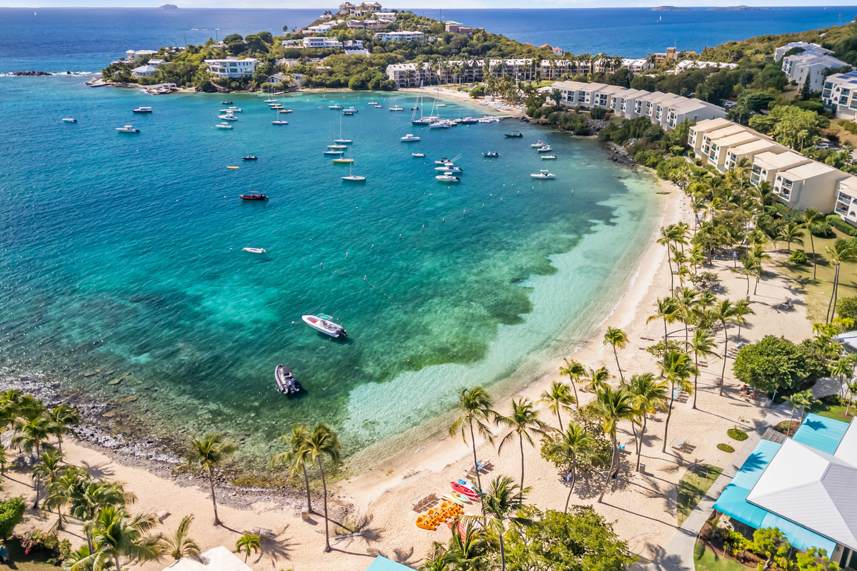 Experience the beauty of St. Thomas from above, where lush tropical landscapes meet the turquoise Caribbean Sea.