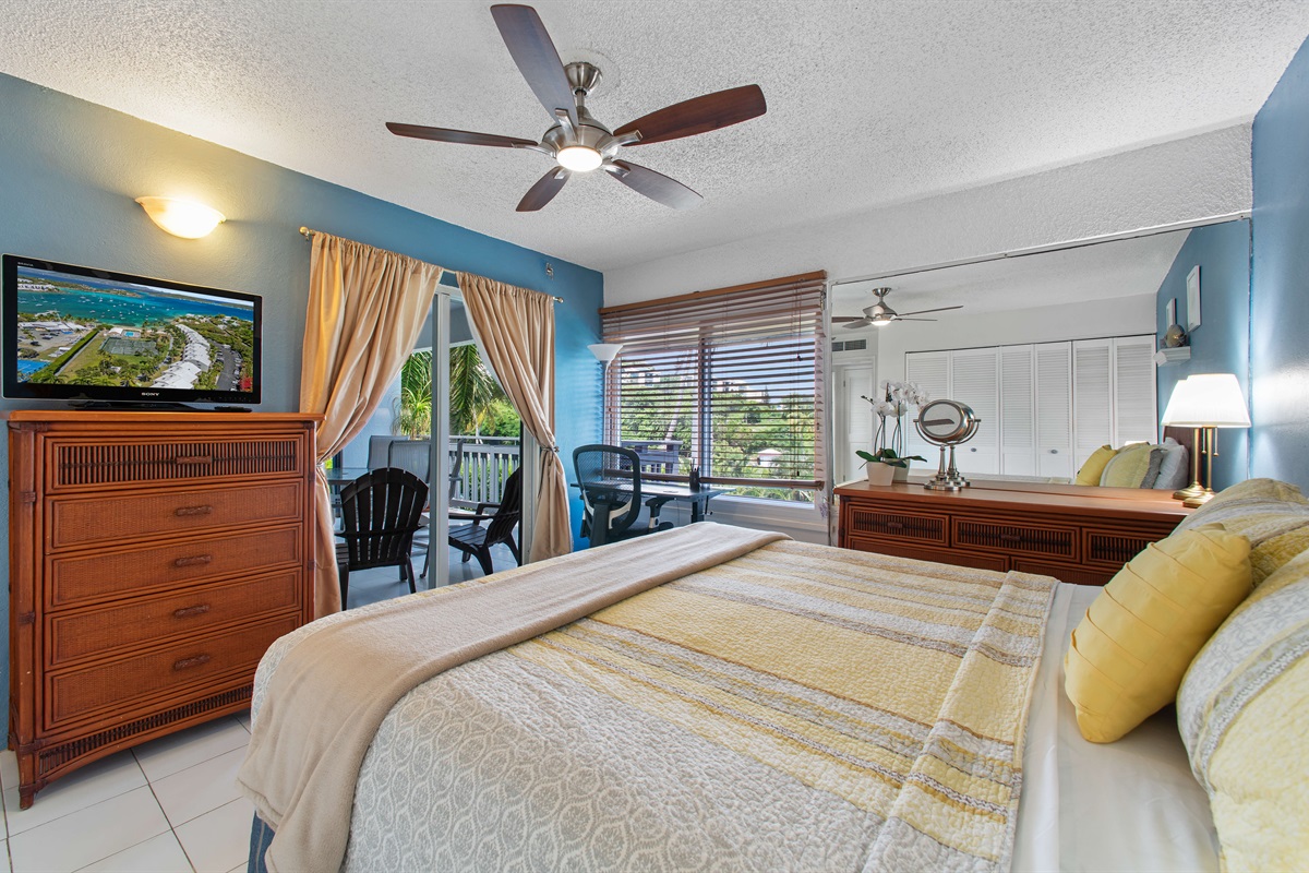 Primary bedroom right off the living room and porch