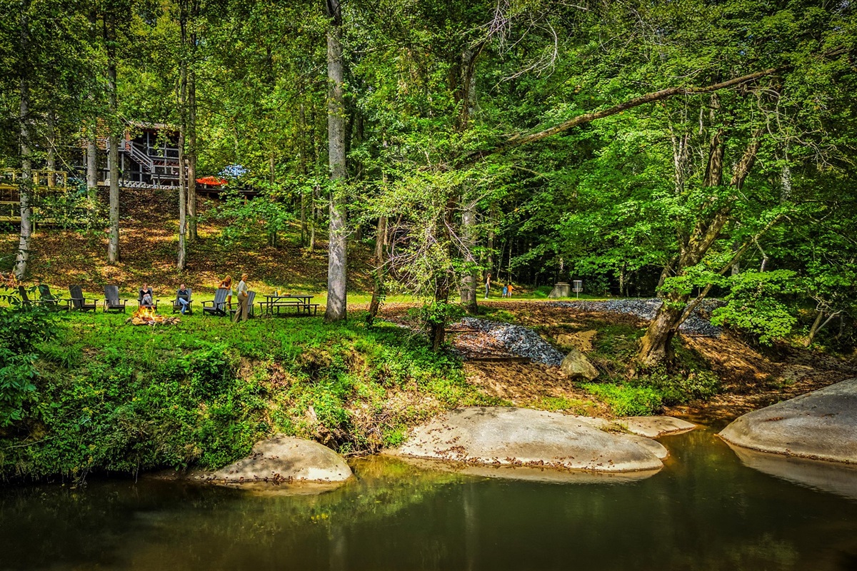 The sound of the river sets the perfect backdrop to cool off in the pool, unwind on the deck, or gather around the fire pit under the stars. 