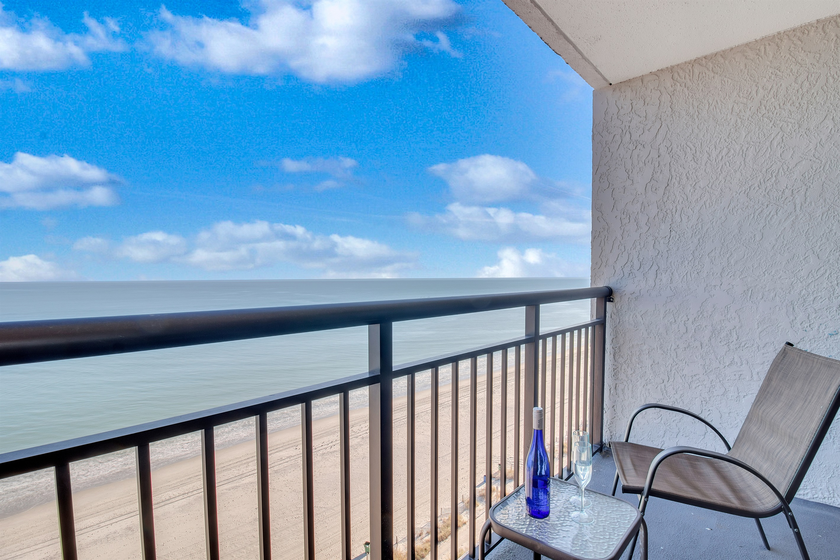 Sit back, relax and sip a cup of coffee while enjoying the front row seat view of the skyblue sea.