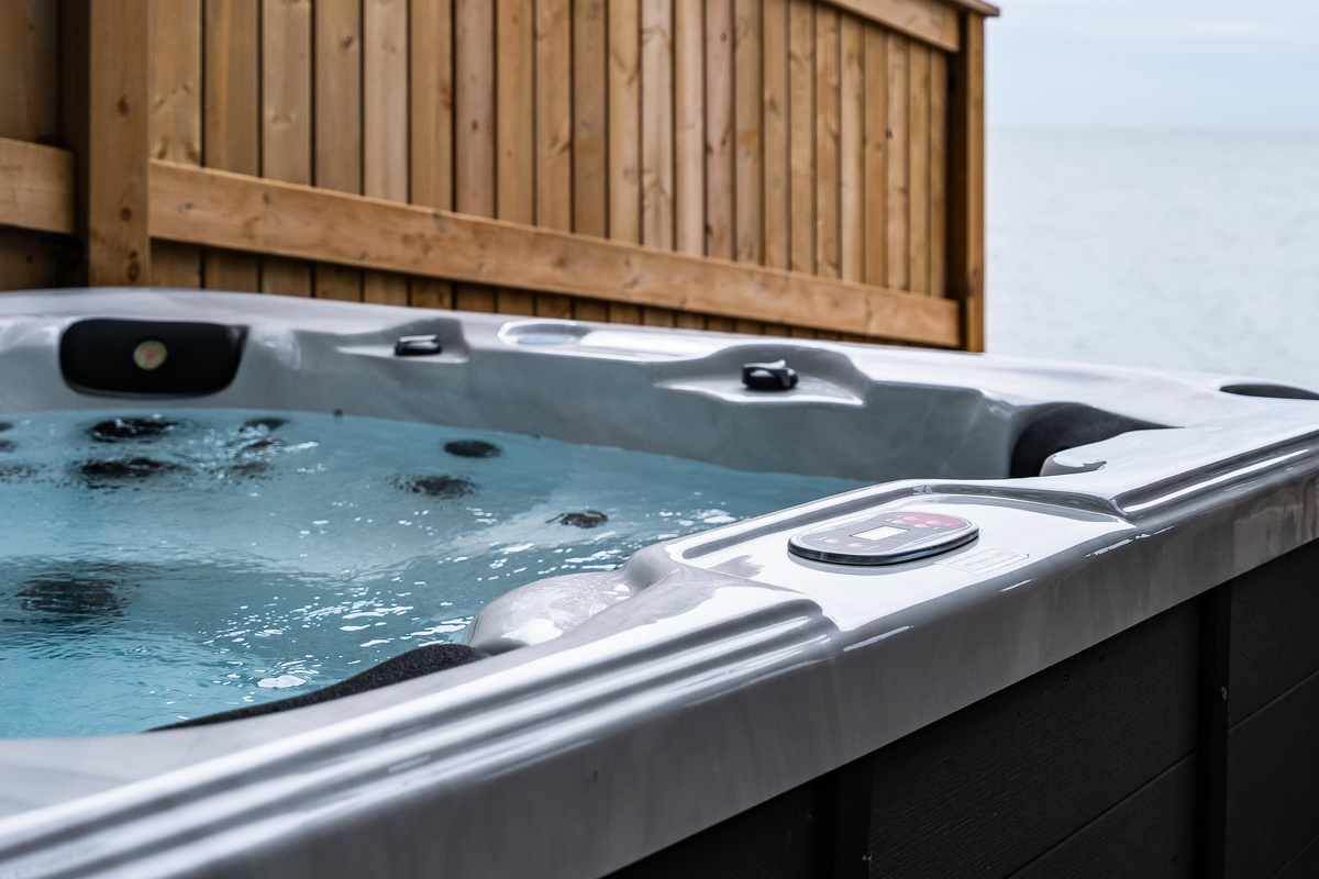 Close-up view of the inviting hot tub and its modern finishes.