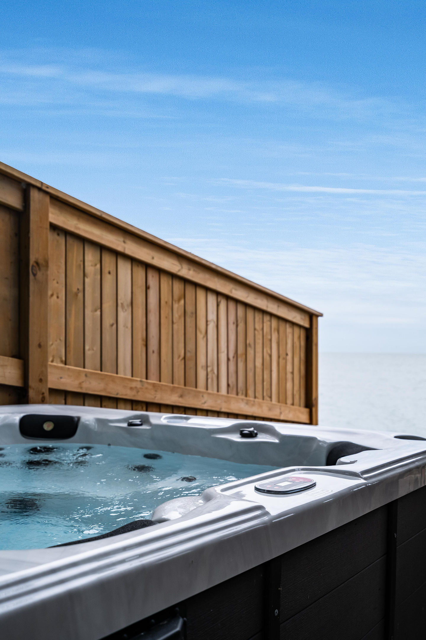 Close-up view of the inviting hot tub and its modern finishes.