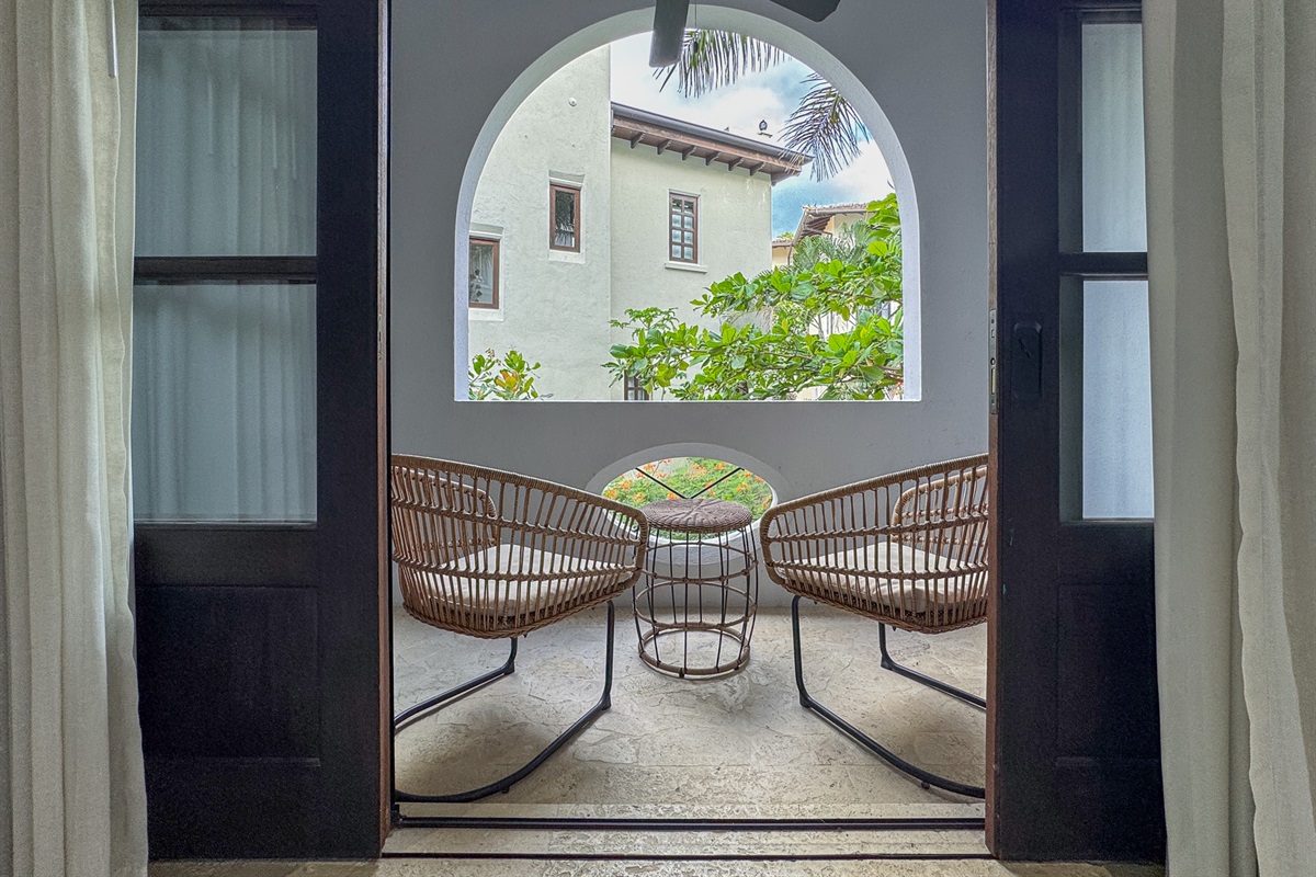 Private covered porch from primary bedroom.