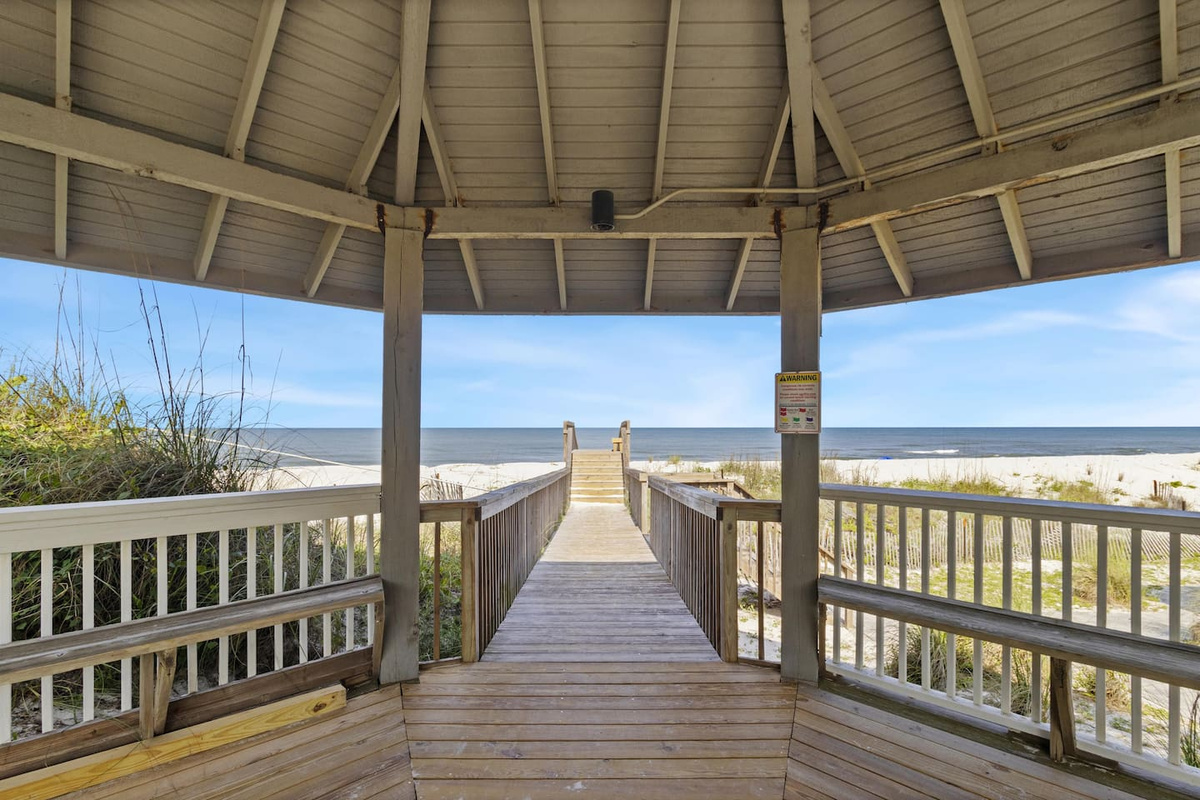 Head down the pavilion boardwalk for private beach access &mdash; no public parking lot, no crowds, just sand.