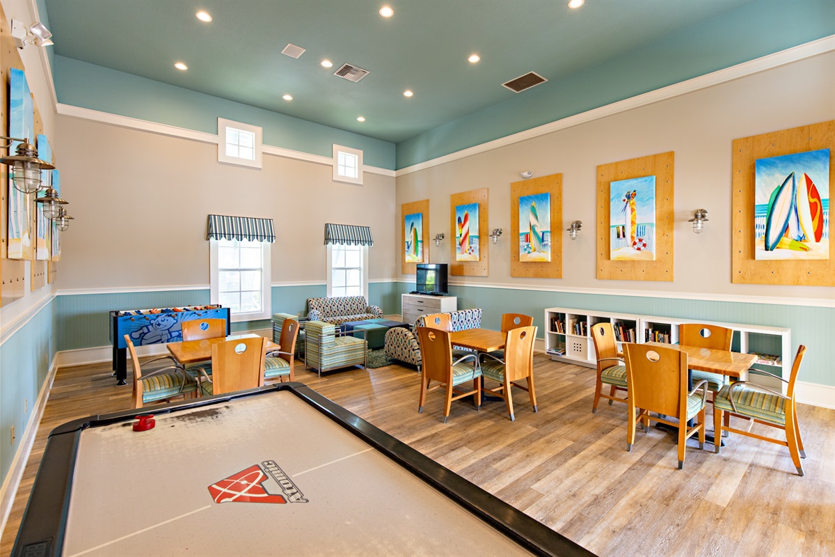 🎮🃏 Game night, anyone? This bright Cinnamon Beach clubhouse lounge is perfect for family fun—challenge the kids to air hockey, kick back in the cozy seating area, or grab a table for cards, board games, and laughs that turn into vacation memories. 😄🏖️
