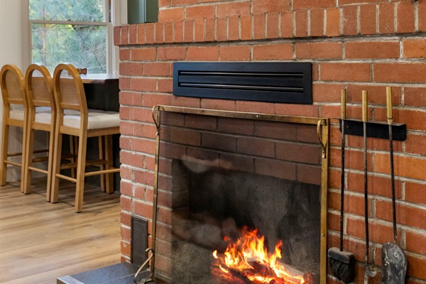 Wood burning fireplace in the living room - near the kichen and dining rooms as well, makes the whole cabin feel cozy. Wood is provided.