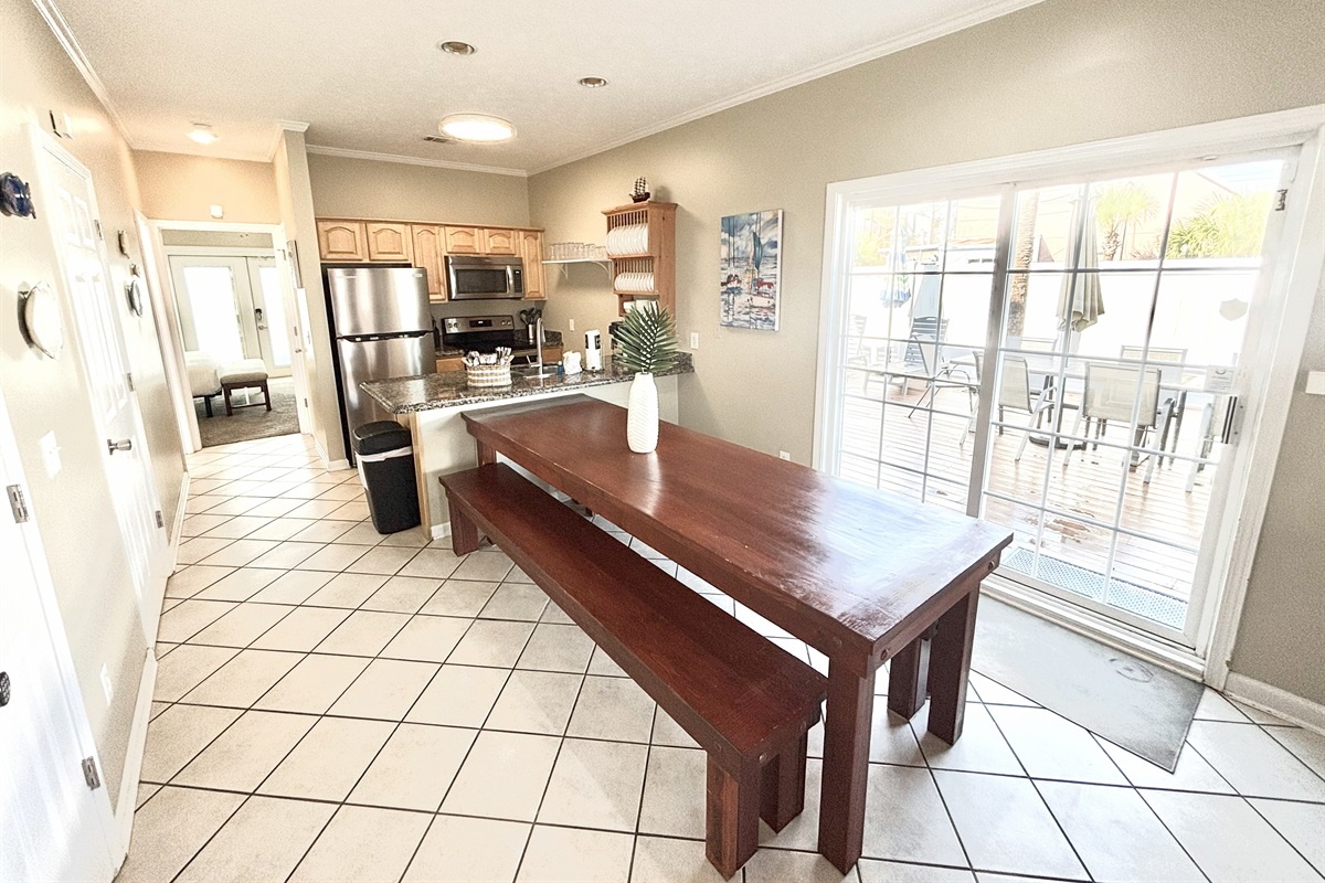 Dining area leading to backyard