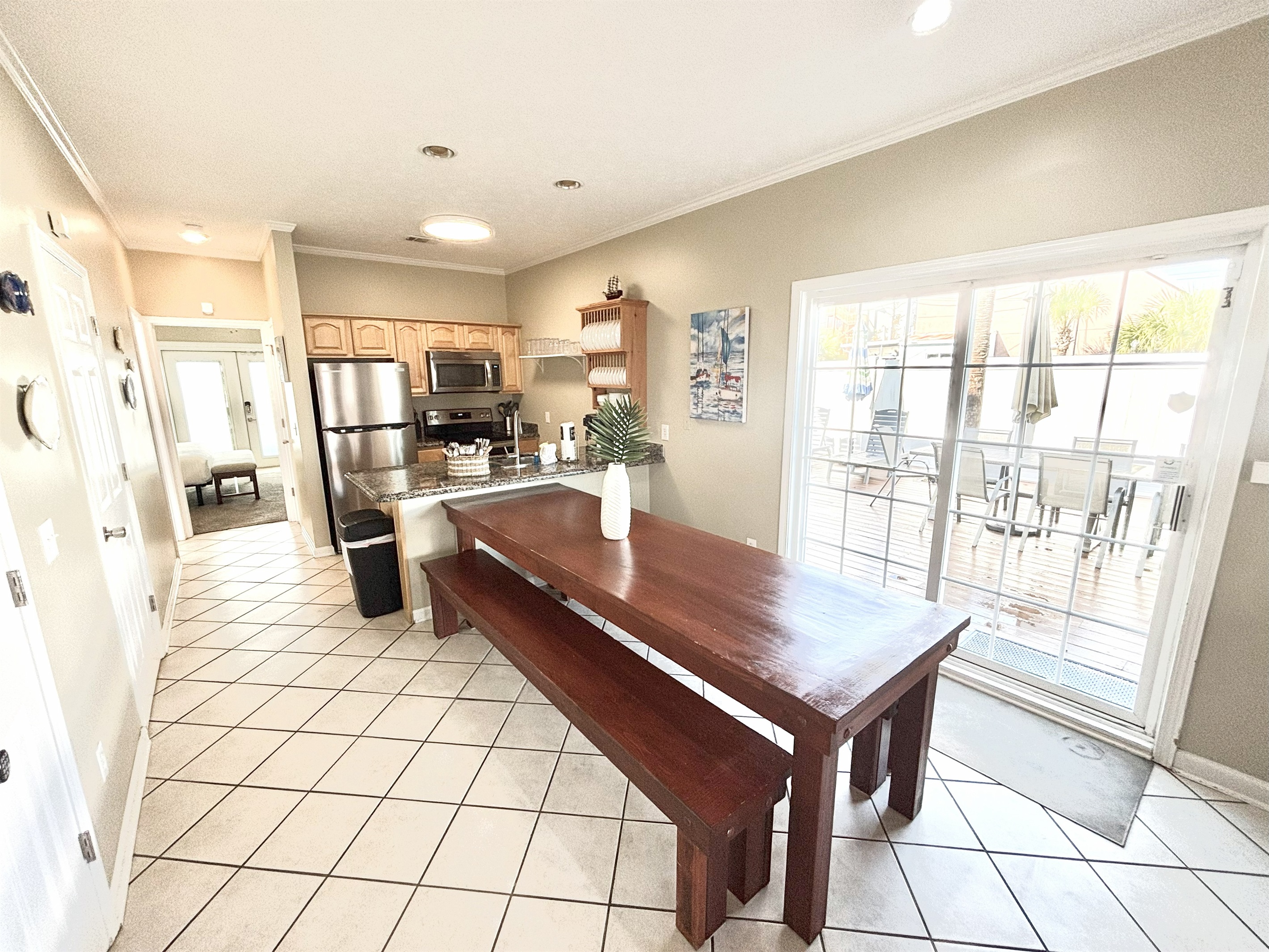 Dining area leading to backyard