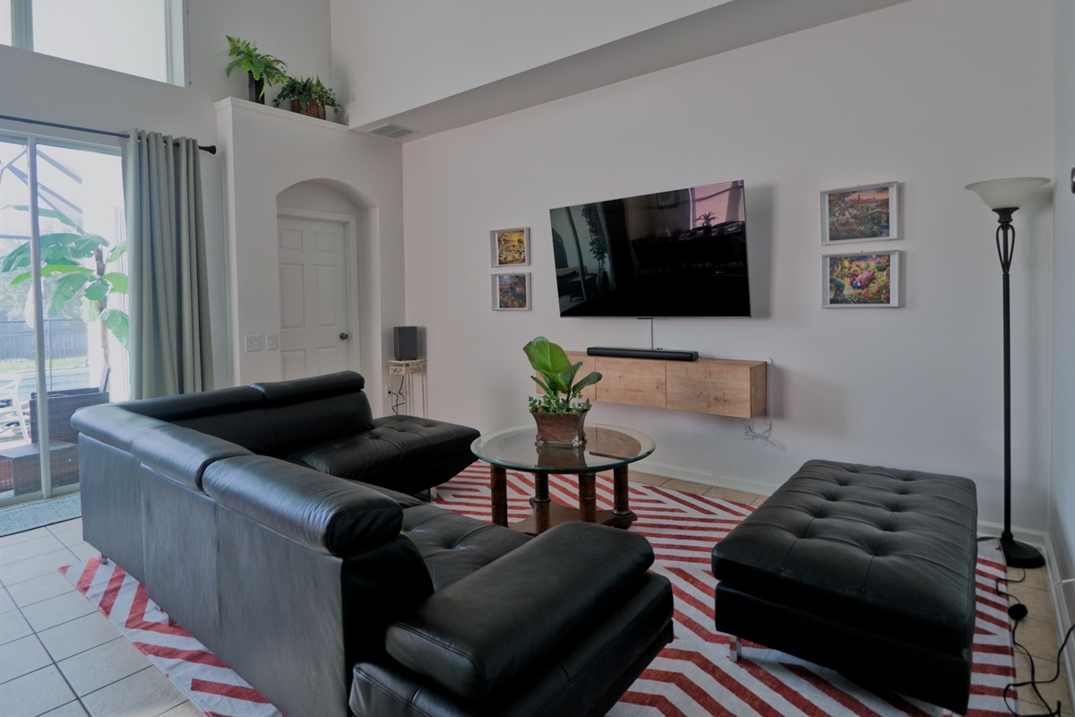 Living room with Smart TV + soundbar.