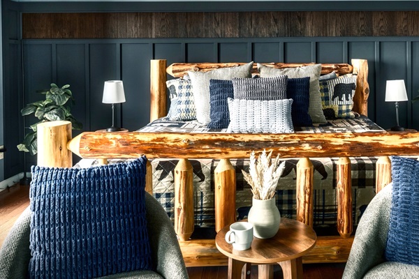 Start your day with panoramic mountain views without ever leaving your bed. This main-floor master suite is designed to impress.