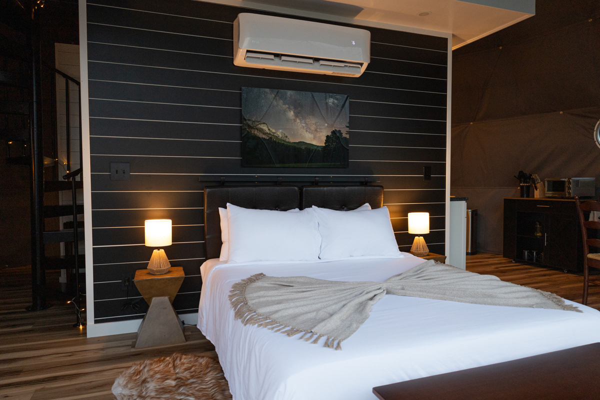 sleeping area. queen bed