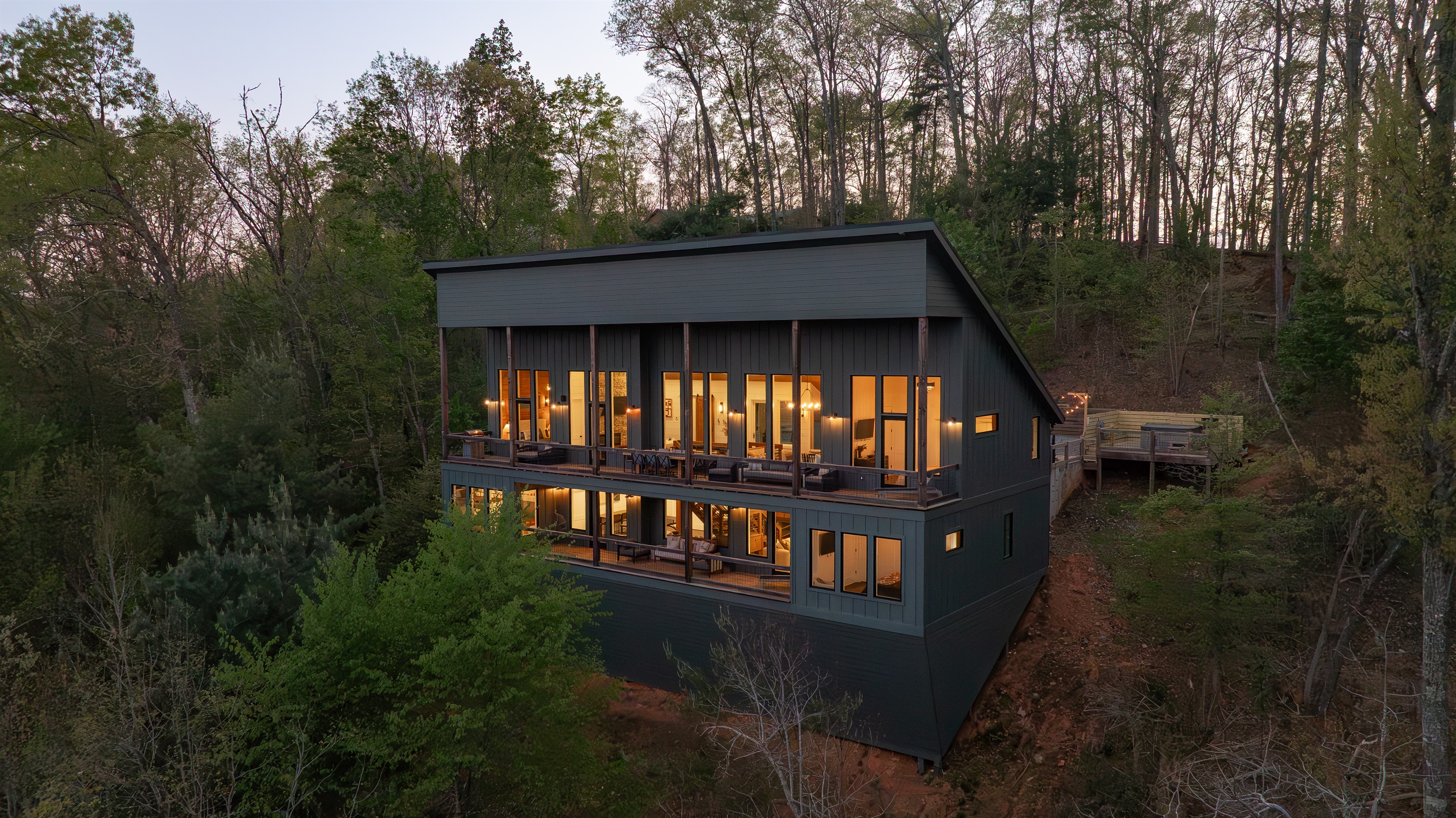 Exterior | Architecturally striking retreat with panoramic long-range mountain views