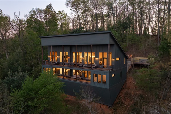 Exterior | Architecturally striking retreat with panoramic long-range mountain views
