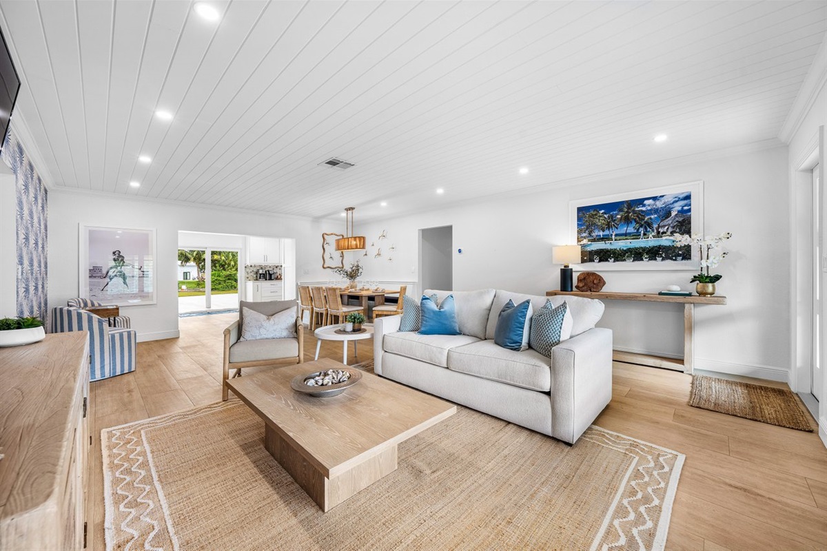 Sunlit coastal living meets effortless comfort in this beautifully styled open-concept space, where soft neutrals and ocean-inspired accents create a serene Boynton Beach retreat.