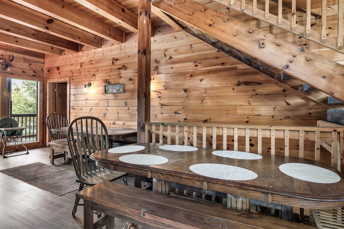 Gather everyone around two large dining tables that make shared meals, prayer, and celebrations feel natural.