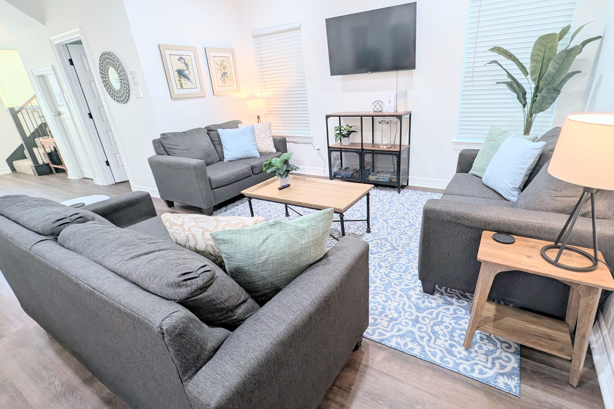 Tons of comfy seating around the Roku TV (bring your log-in to watch your favorite streaming services), or to play a game stocked in the cabinet. 
