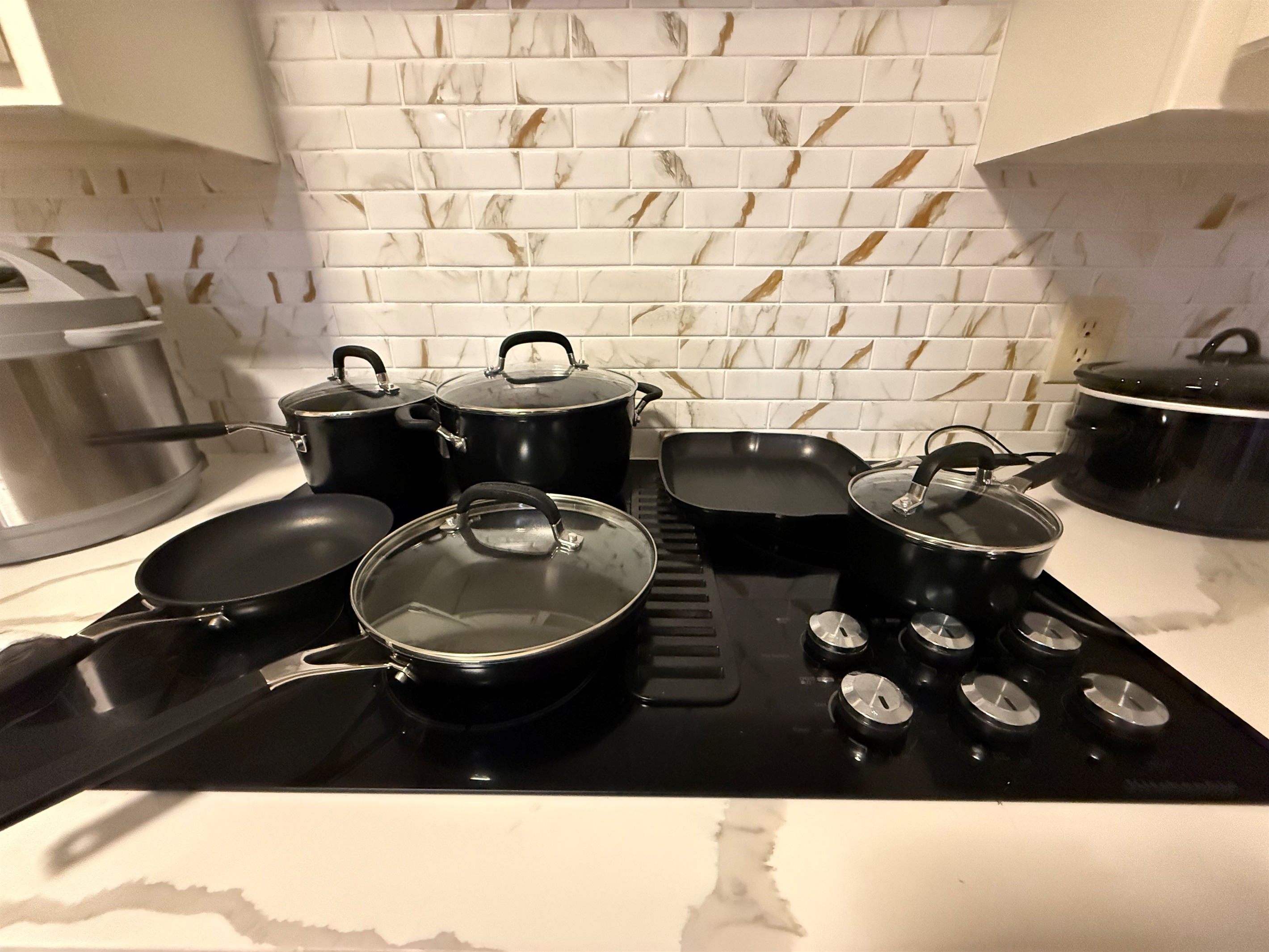 Kitchen stocked with KitchenAid cookware
