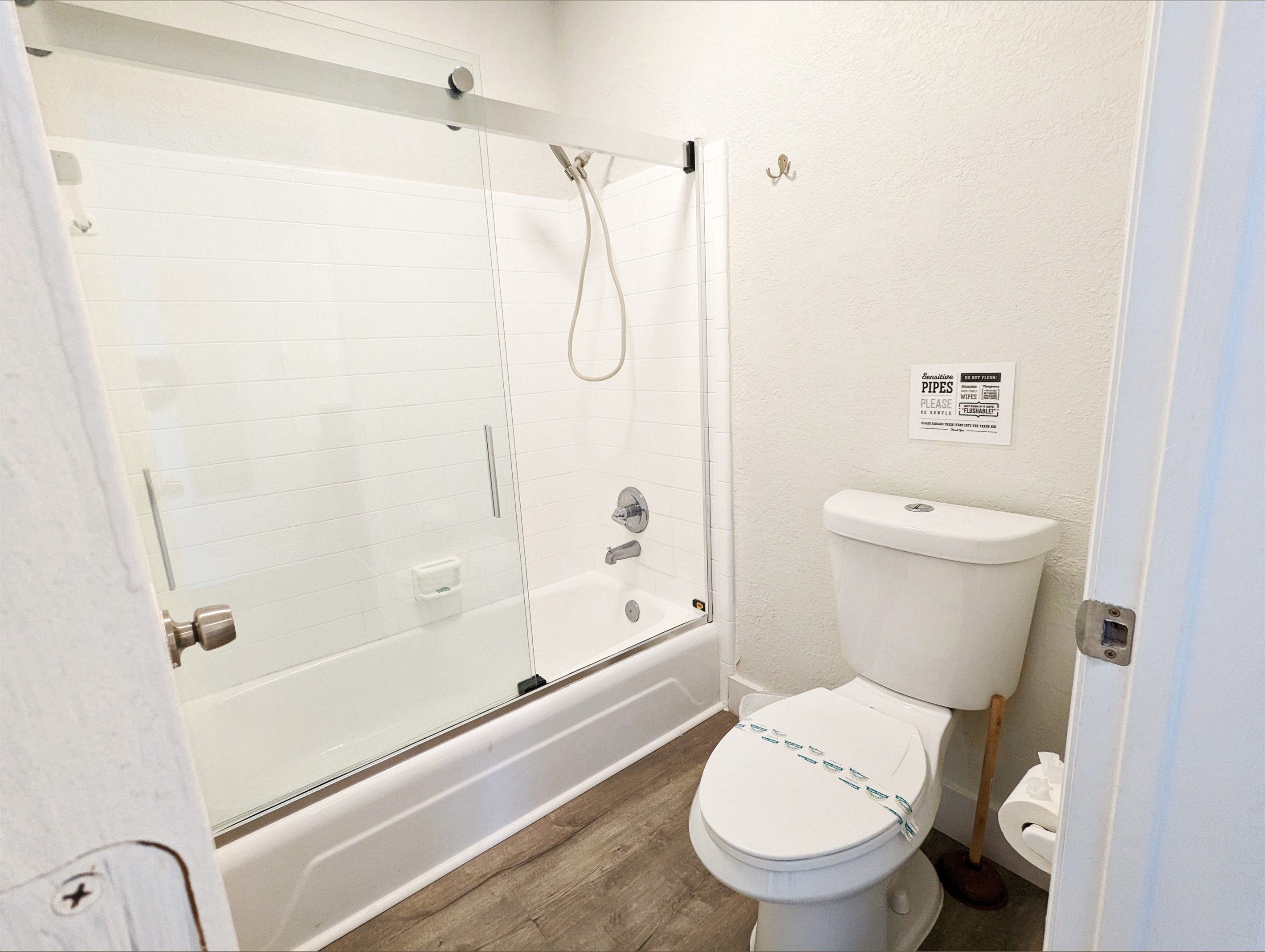 Bathroom with tub/shower combo.