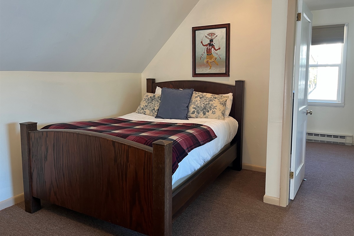 Double bed in living area with Queen bdrm beyond