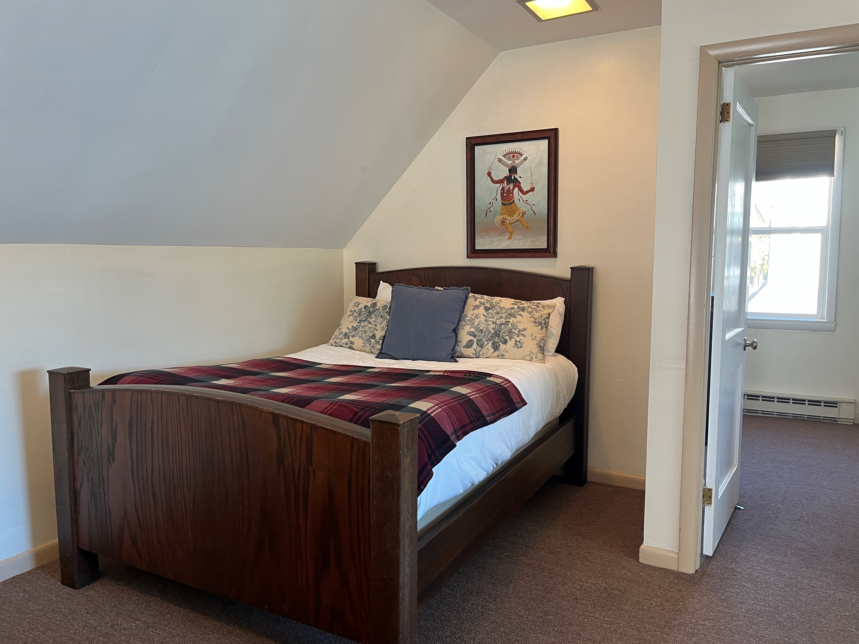 Double bed in living area with Queen bdrm beyond