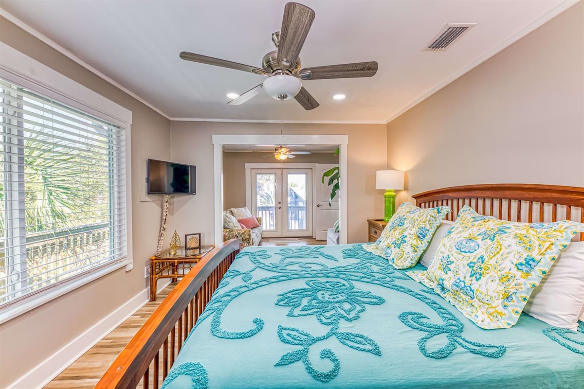 Bedroom Retreat: Serene space with vibrant decor and charming views, perfect for restful nights!