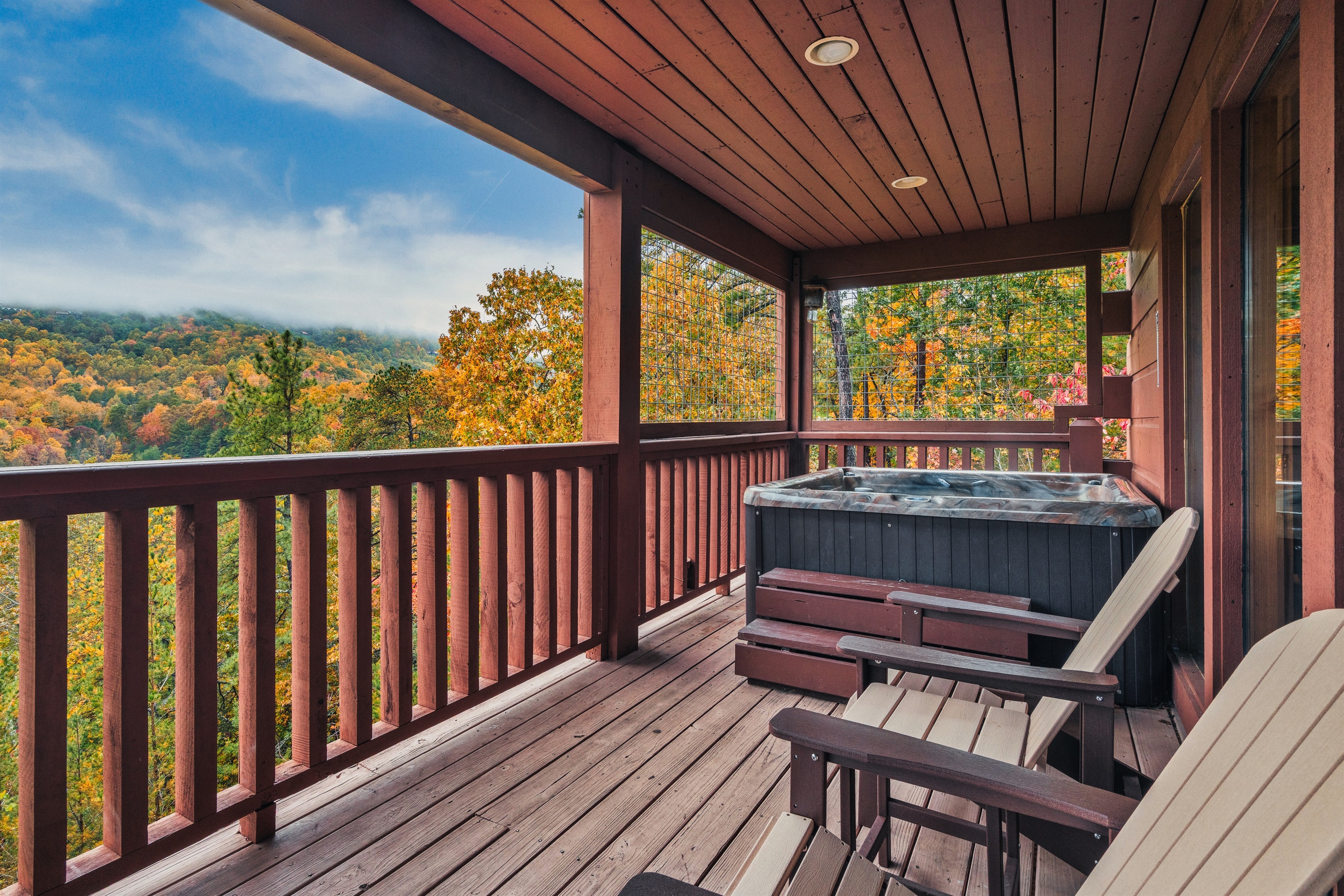 Escape to your private deck off the primary bedroom. Soak in the hot tub with mountain vistas - the perfect spot for morning coffee or stargazing.