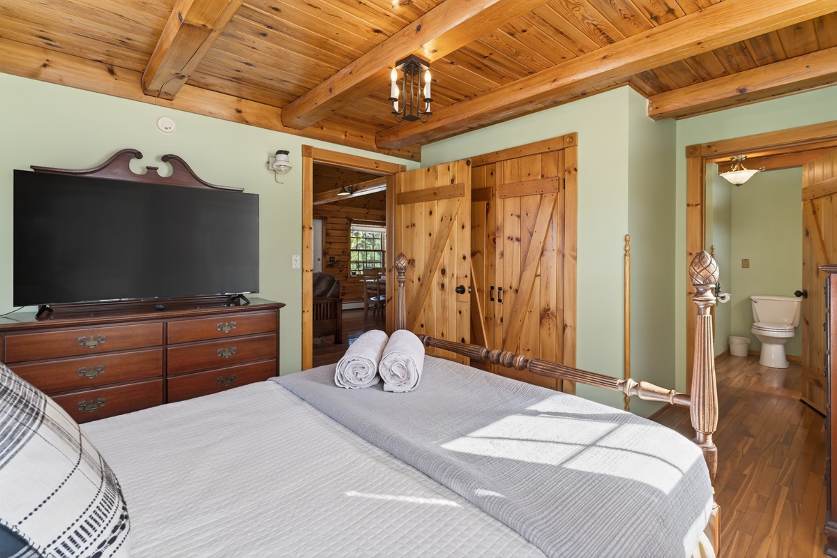 Main floor Queen bedroom with access to shared bathroom