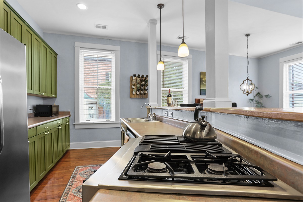 Modern appliances meet timeless charm in this stunning kitchen.