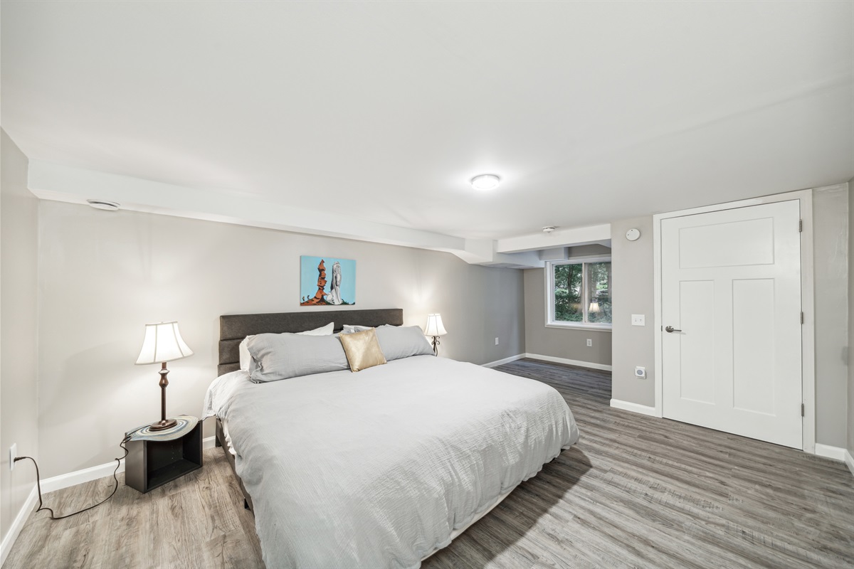 Spacious king bed in the front bedroom, 36" wide exterior door, closed off for privacy.