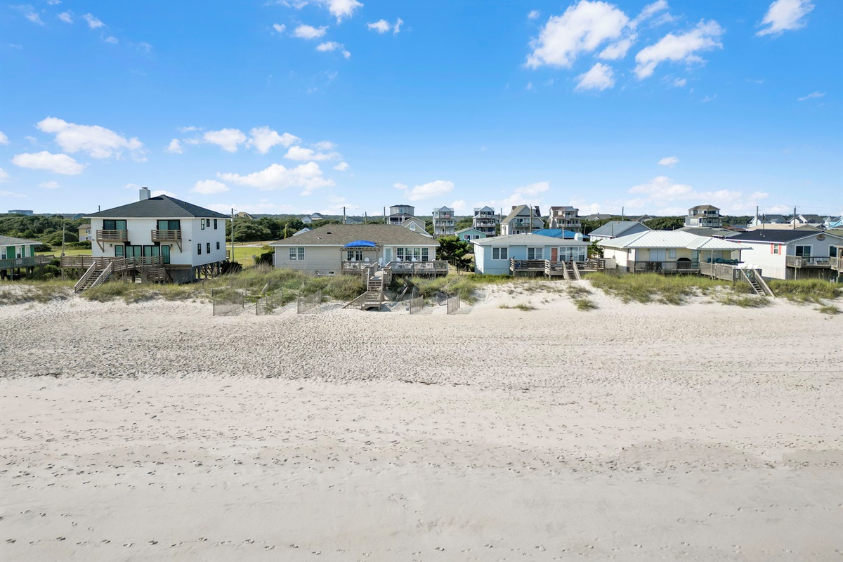 Step right out onto the sand.