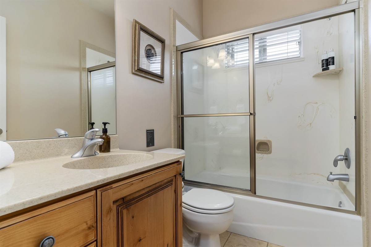 Full bathroom with shower/tub combo—perfect for a relaxing soak or quick refresh.