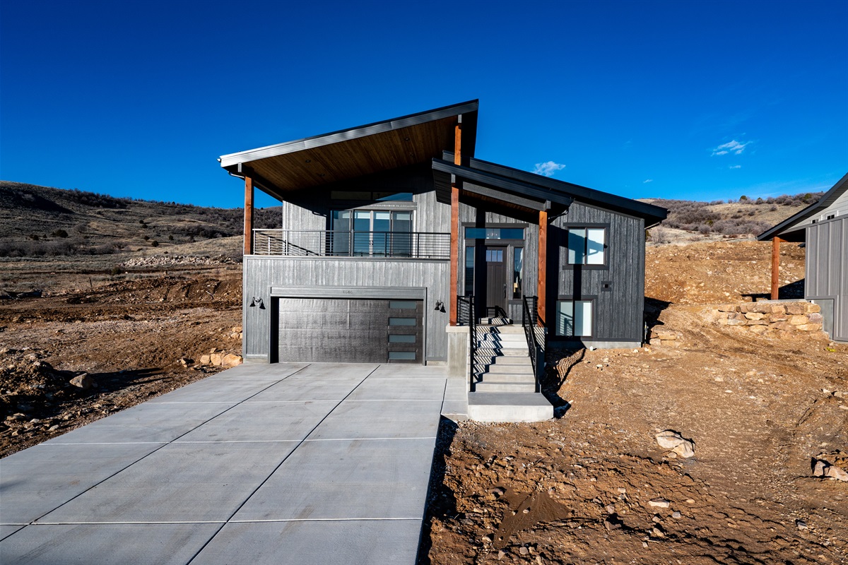 Contemporary exterior design set against Utah’s rugged landscape.