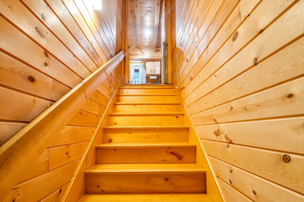 Stairwell coming off kitchen, leading to basement level