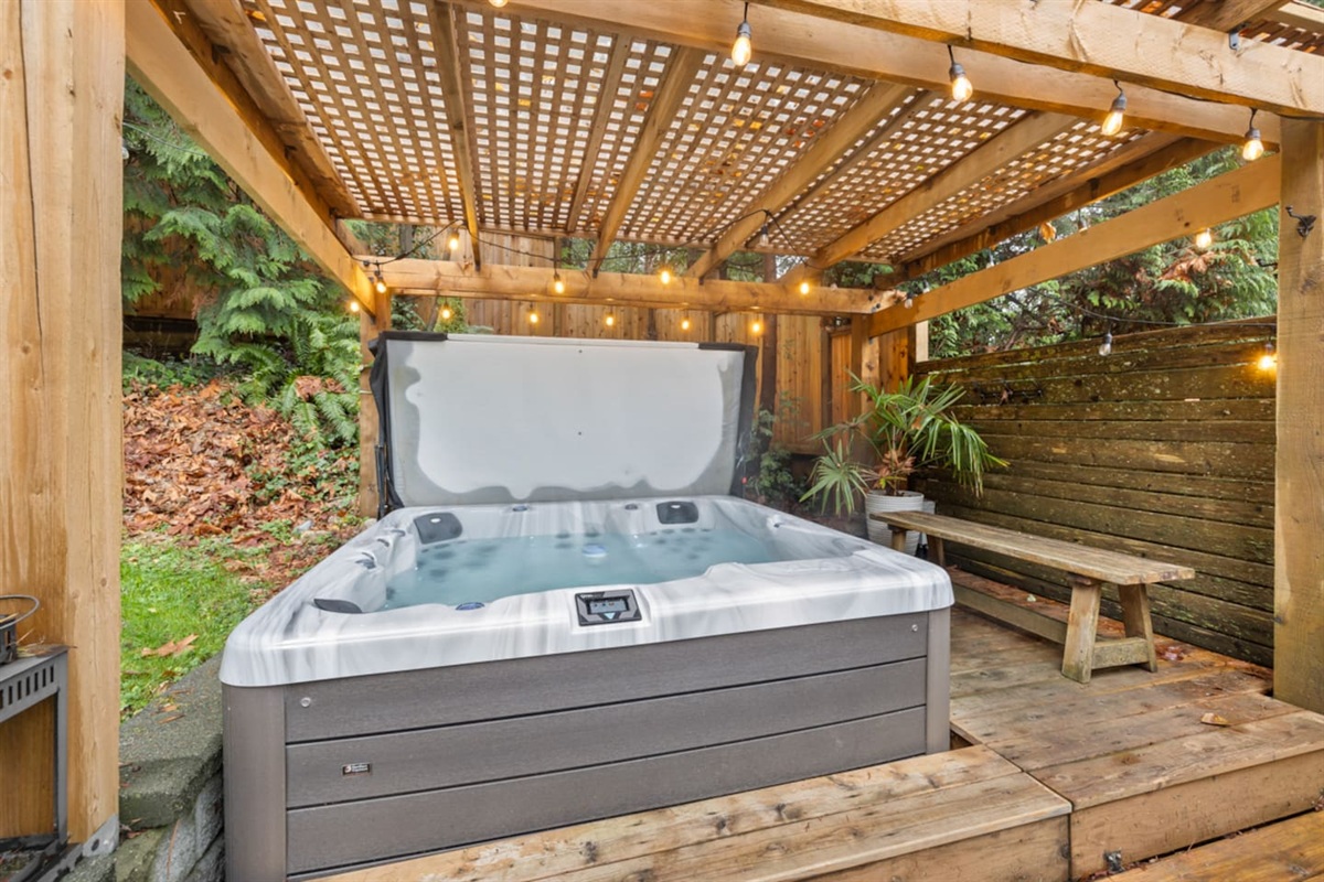Outdoor hot tub with cover