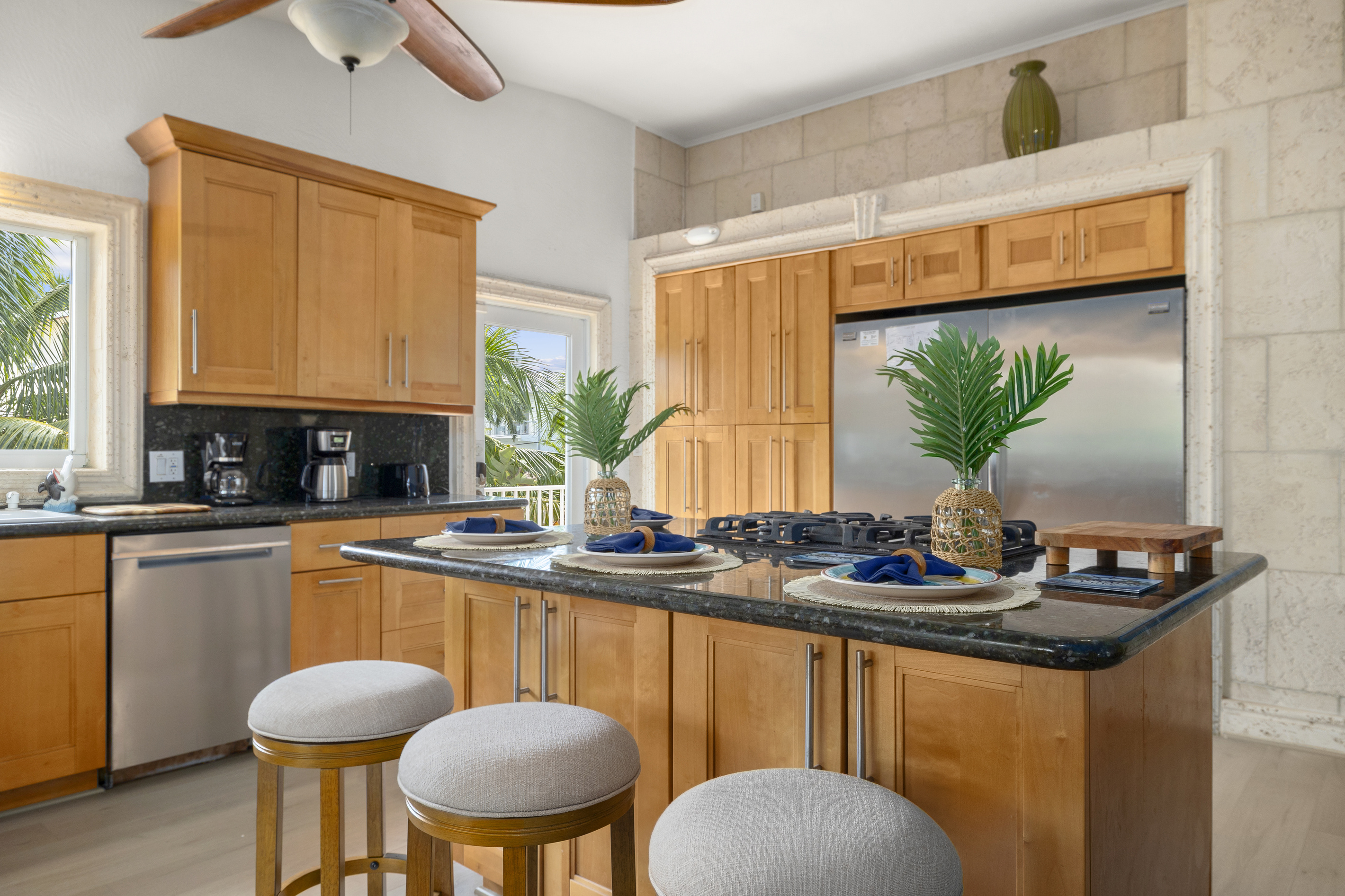 Plenty of seating for the entire group and a double width refrigerator.