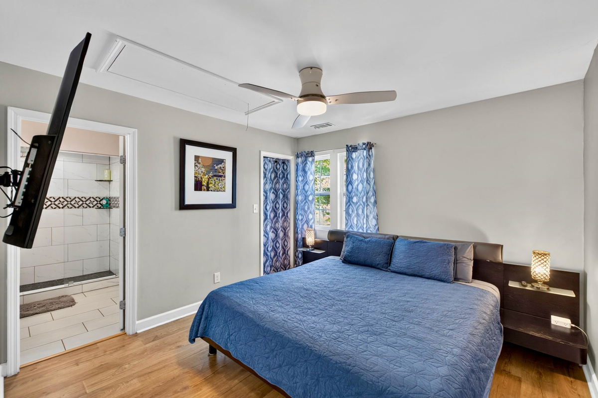 The first king bedroom is upstairs and shares an on-suite bathroom with the queen bedroom.