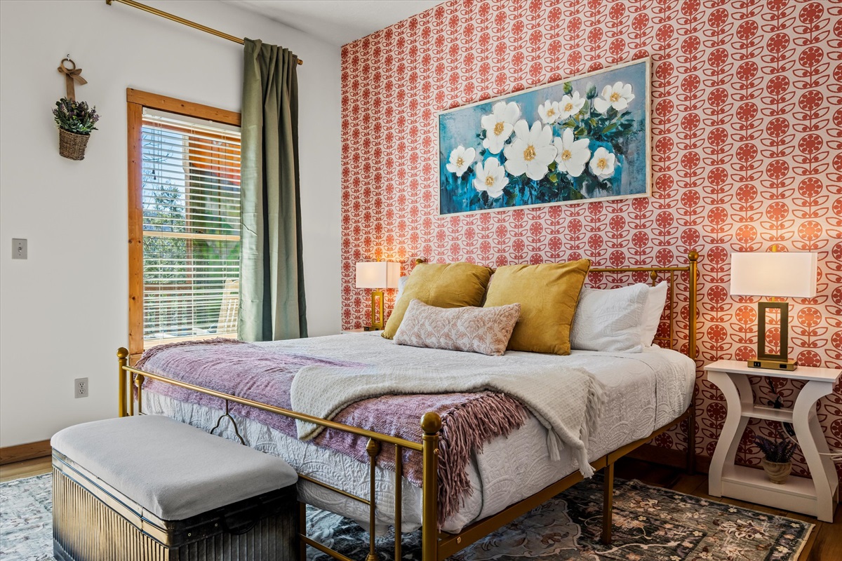 Our other designer-remodeled King suite (downstairs) has beautiful flowery vibes