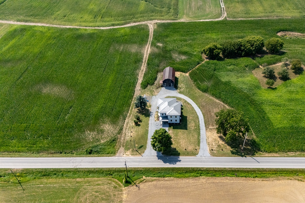 Bird’s-eye view showcasing endless farmland and privacy—ideal for serene country living.