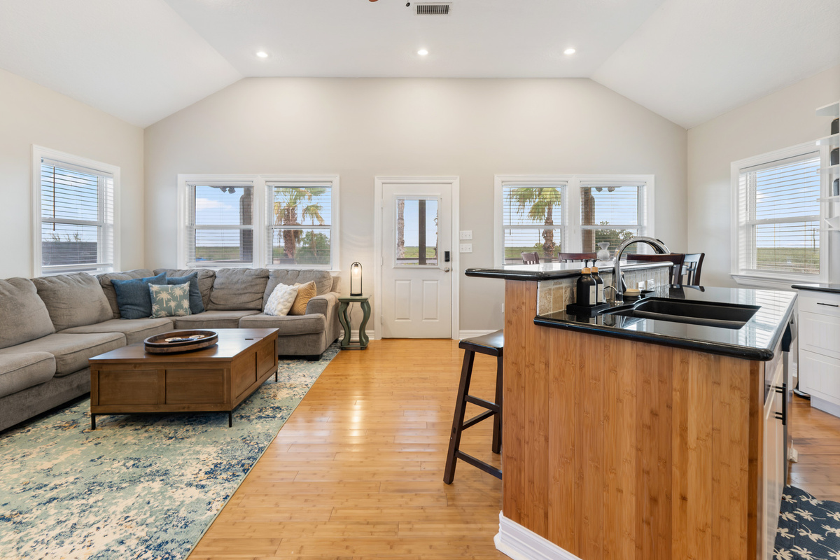 Living area and kitchen view.